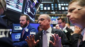 Traders work on the floor of the New York Stock Exchange (NYSE) the morning after Donald Trump won a major upset in the presidential election on Nov. 9, 2016 in New York. (Spencer Platt/Getty Images)