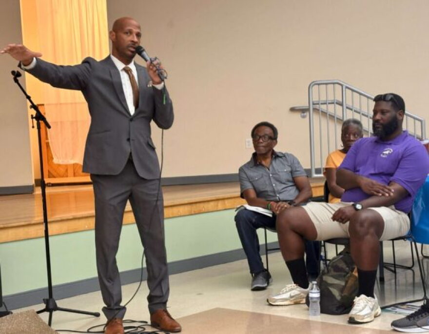 Sarasota City Commissioner Kyle Battie speaks during the Newtown Thriving Community Conversation on Aug. 25 at the Robert L. Taylor Community Complex. The event brought residents together to hear updates on revitalization efforts and discuss priorities for Newtown’s future.