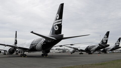 FILE — In this April 6, 2020, photo, Air New Zealand planes sit idle on the tarmac at Christchurch Airport, New Zealand.