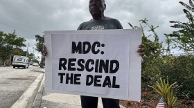 Marvin Dunn holding a "teach-in" protest in Overtown over the Trump presidential library