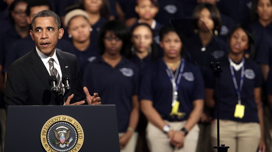 President Obama speaks about strengthening the middle class and the nation's struggle with gun violence at Hyde Park Academy in Chicago on Friday.