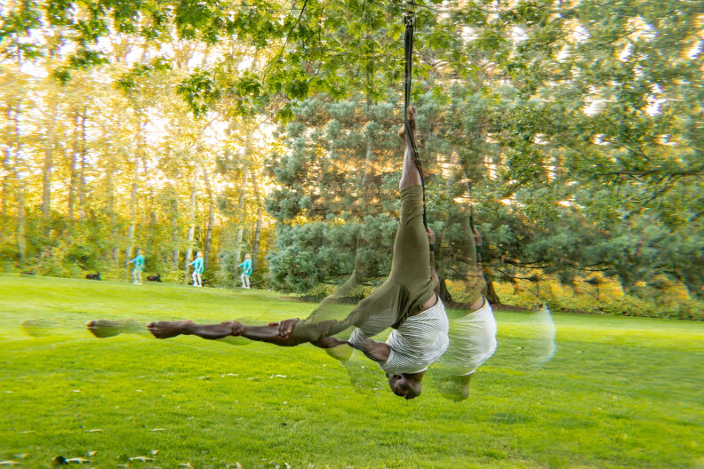 Sometimes aerial performers attach their rigs to trees. Cuream Jackson practices skills on a maple tree in Julia Davis Park, Boise.