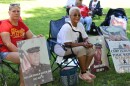 Debbie Fultz Martin (left) and Karen Swindler display photos of their husbands outside the U.S. Capitol on June 4, 2026. Both men died of cancer after serving at Camp Lejeune.