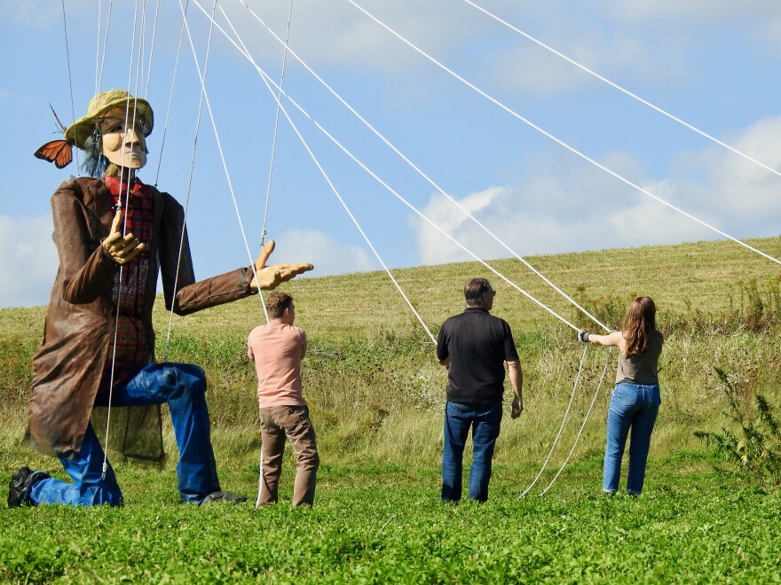 Performance of “The Giant Farmer of Plain” by artist Christopher Lutter-Gardella. Collaborators include the Village of Plain, Kraemer Bros., WEdances Movement Collaborative & community artists.