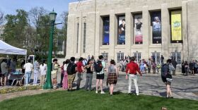 IU grad students cheer faculty exiting the IU Auditorium after the no confidence vote.