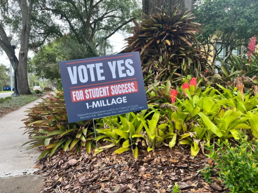 A sign in support of the 1-mill increase outside a home on Frank Lloyd Wright Way.