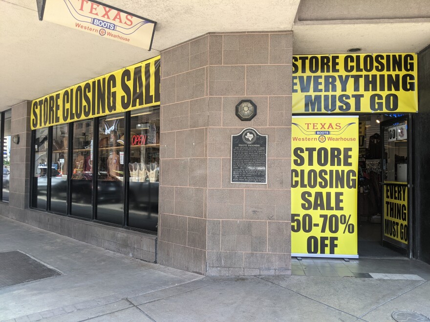 Texas Western Warehouse at the corner of Commerce and Soledad Streets holds a store closing sale.