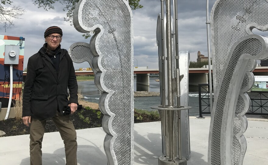 Michael Bashaw with Wind in the Garden sculpture.