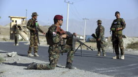Afghan national army (ANA) Soldiers stand guard at a checkpoint on the outskirts of Kabul, Afghanistan, Monday, Aug. 21, 2017. President Donald Trump will use a nationally televised address to outline for a war-weary nation the strategy he believes will best position the U.S. to eventually declare victory in Afghanistan after 16 years of combat and lives lost. (Rahmat Gul/AP)