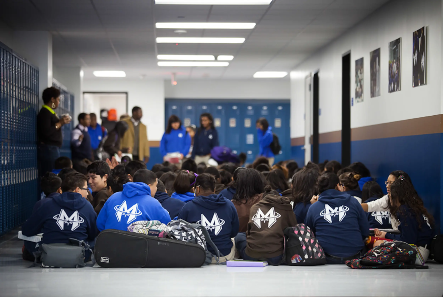 Students sit in the hall before heading to their first class at Yes Prep West Campus in Houston. A major school funding bill died Saturday — along with teacher raises and a voucher-like program — when lawmakers couldn't reach agreement before a key legislative deadline.