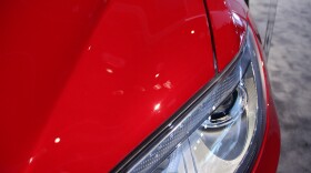 A fingerprint on the Tesla Model S at the Detroit auto show.