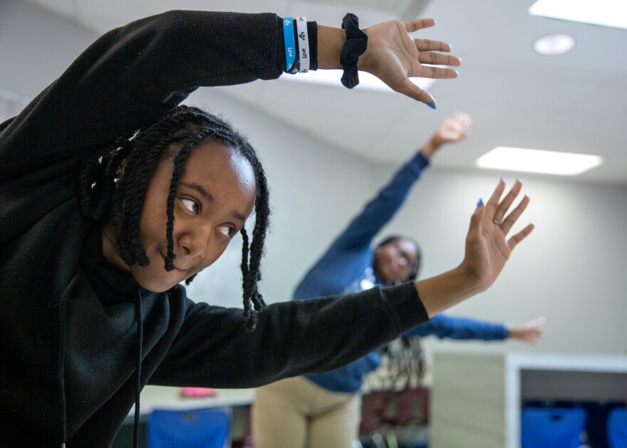Frankie Session attends a yoga class on Wednesday, Sept. 6, 2023, at Compton-Drew Middle School in St. Louis, Mo. The class was visited by U.S. Secretary of Education Miguel Cardona; U.S Secretary of Health and Human Services Xavier Becerra; U.S. Deputy Secretary of Education Cindy Marten; U.S. Deputy Secretary of Education Cindy Marten; U.S. Rep. Cori Bush, D-St. Louis County; and St. Louis Public Schools Superintendent Keisha Scarlett.
