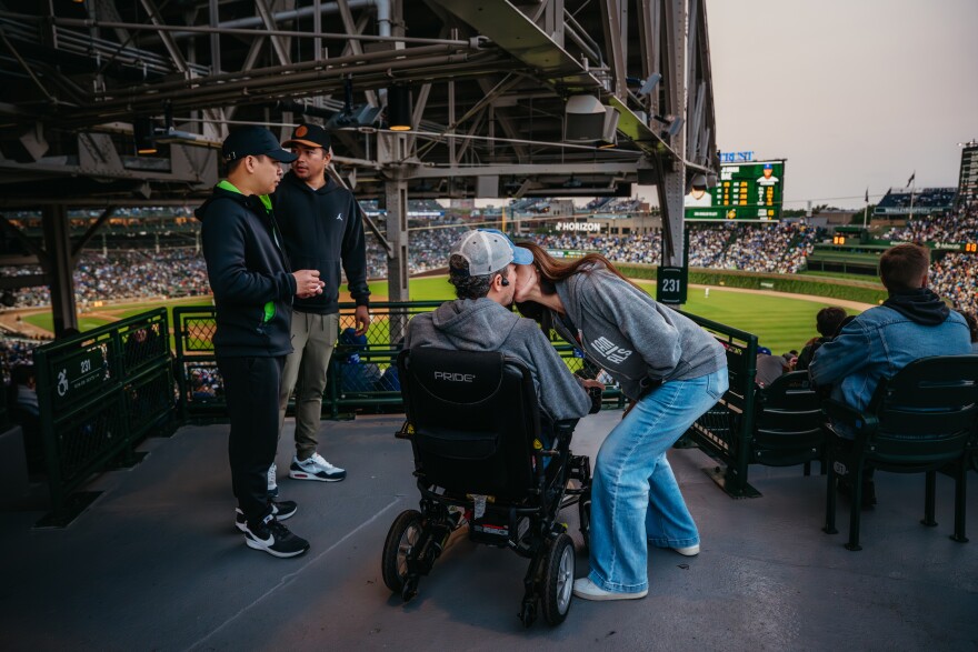 Abrevaya and Wallach share a moment at Wrigley Field in June on Lou Gehrig's Day.