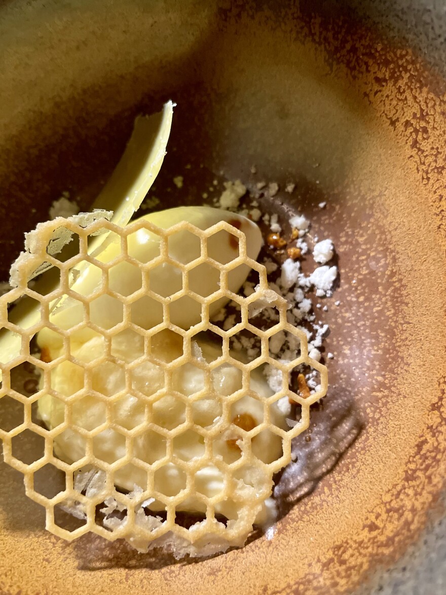 A honeycomb-like crisp rests over a selection of cheeses in a dish from Prospect in Aspen, served on Nov. 16, 2023. The restaurant’s new menu is hyperfocused on ingredients grown and produced within the state of Colorado.