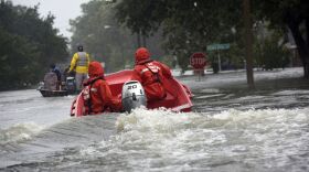 Coast Guard Petty Officers 3rd Class Eric Gordon and Gavin Kershaw pilot a 16-foot flood punt boat and join good Samaritans in patrolling a flooded neighborhood in Friendswood, Texas, Aug. 29, 2017. The flood punt team from Marine Safety Unit Paducah, Ken