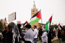 Protesters line Mill Creek Parkway to demand a ceasefire in Gaza on Nov. 4, 2023.