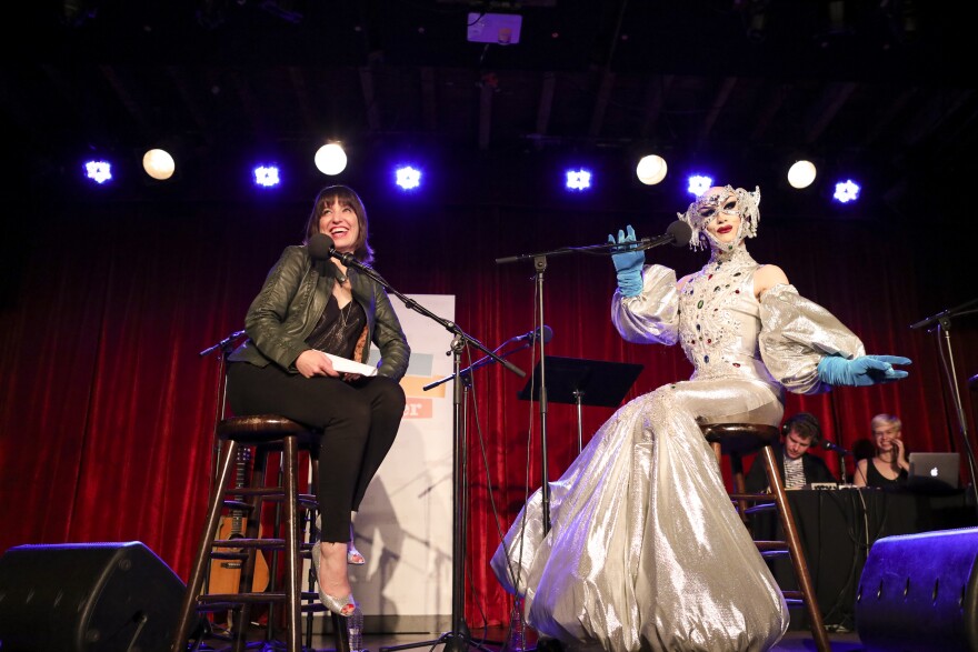 Host Ophira Eisenberg and Sasha Velour strike poses on Ask Me Another at the Bell House in Brooklyn, New Yor