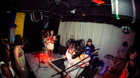 Kennie Mason (bottom right) is the lead singer of SIICHAQ, an indie-rock band from Jacksonville.