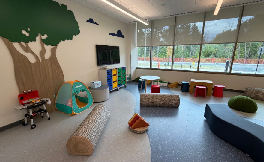 Amenities include three basketball courts, a one-mile indoor walking track, snack bar, fitness center, multi-sport simulator, playground, rentable event space, and child watch center.