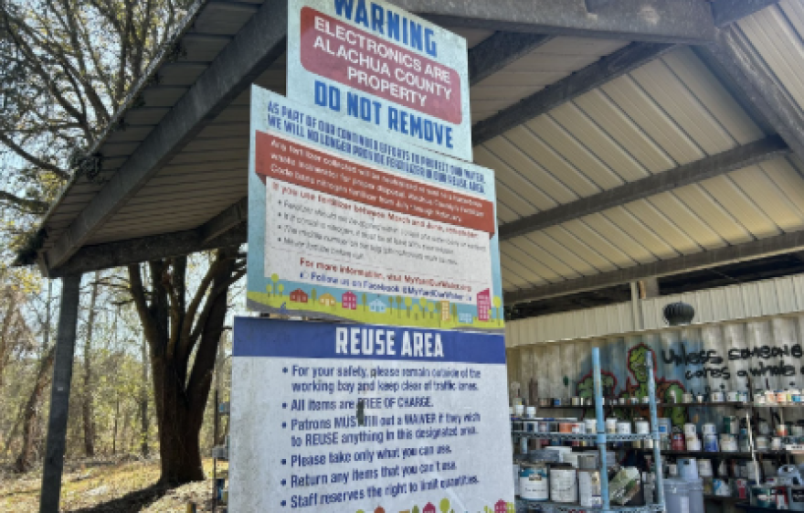 A hazardous waste sign at Alachua County’s Leveda Brown Environmental Park & Transfer Station. County residents and some businesses can bring electronic waste to the site. (Natalie Kaufman/WUFT)