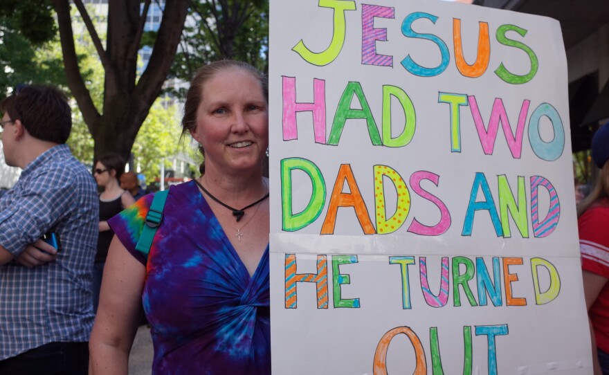 Kathy Bowie was at the pride parade with other members of her church. She said they came to support 'all our gay friends' including the new priest at her parish. 