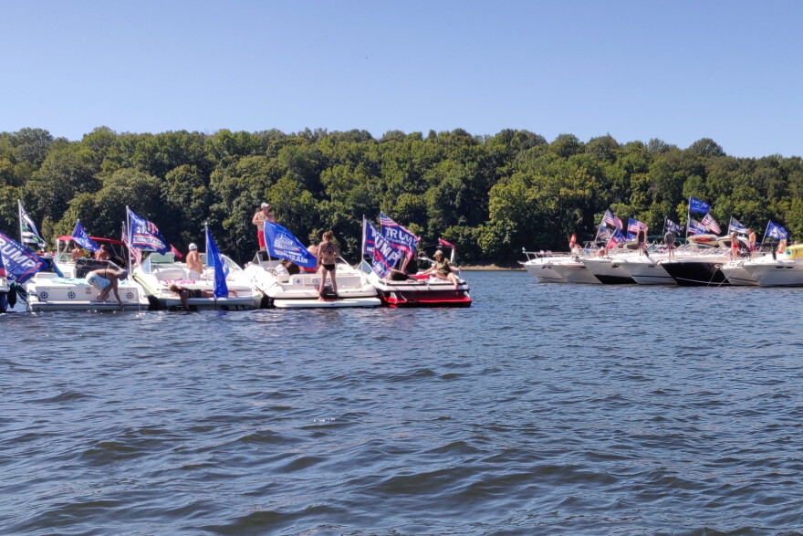 Boats decked out with Trump flags gathered at the Lake Monroe dam before the parade began.