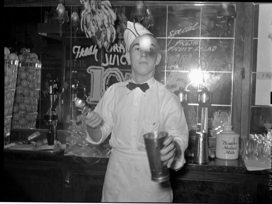 A 1939 soda jerk flips ice cream into malted milk shakes in Corpus Christi, Texas.