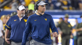 North Texas has hired former West Virginia and Troy coach Neal Brown as its next head coach. Brown takes over from Eric Morris, who is leaving for Oklahoma State after the season.