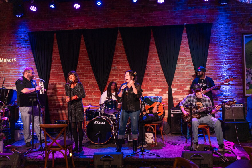 band on stage at Urban Beat in Lansing