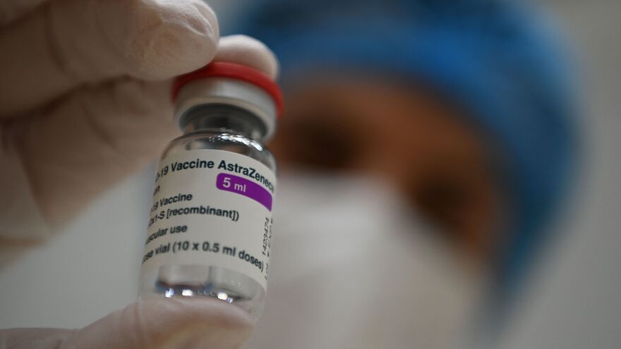 "There are not yet enough vaccine doses in Europe to stop the third wave by vaccination alone," German Health Minister Jens Spahn said Friday. Here, a health care worker displays a vial of the AstraZeneca COVID-19 vaccine in Stuttgart, Germany.