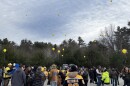 Community members in Standish releasing yellow balloons in honor of Simon Gonzalez, a 5-year-old who was hit and killed by a school bus.