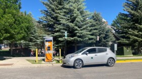 A city-owned Nissan Leaf charges at Aspen’s Rubey Park fast charger in July 2022. The city is committed to converting its entire fleet of vehicles to EVs by 2050.
