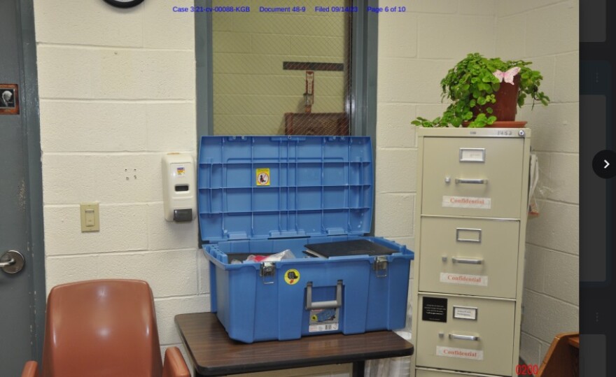 The window to Kenneth Dewitt's office.