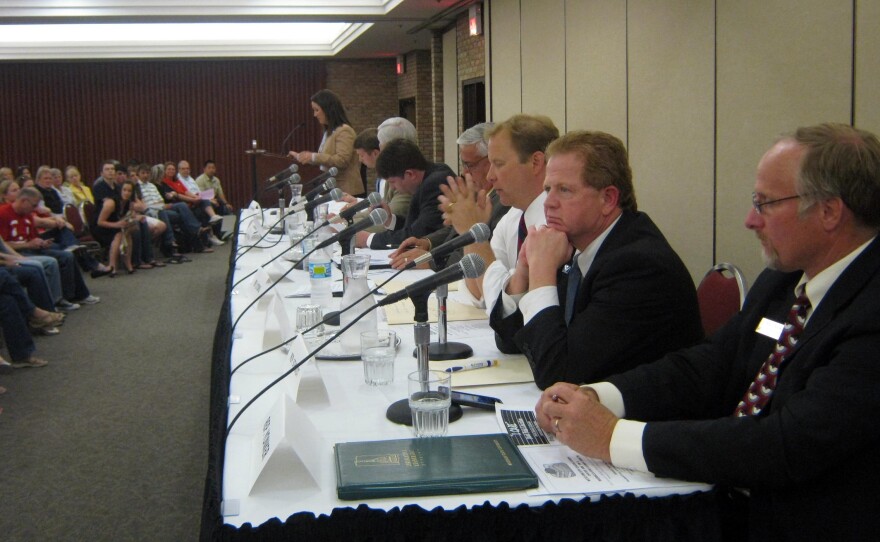 Eight state representatives from Kent County gathered for a town hall meeting to discuss public education funding in Grand Rapids.