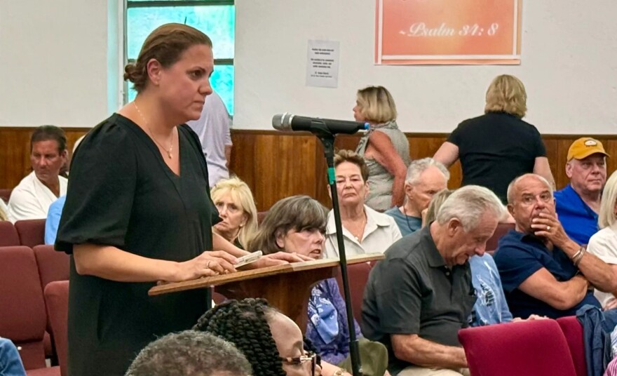 Palm Beach Shores Commissioner Anastasia Karloutsos appealed for a smaller building that would still be profitable.
