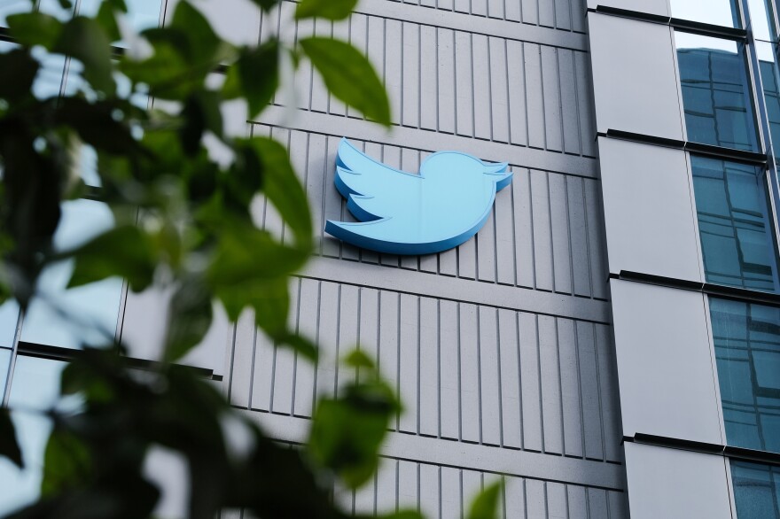 Twitter in San Francisco. The social media company has laid off thousands of workers and contractors, including many involved in determining whether material on the site broke the site's policies or violated U.S. or foreign laws.