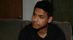 man looking off-camera during interview