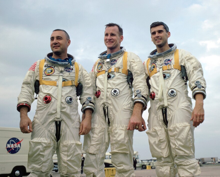 three astronauts at NASA