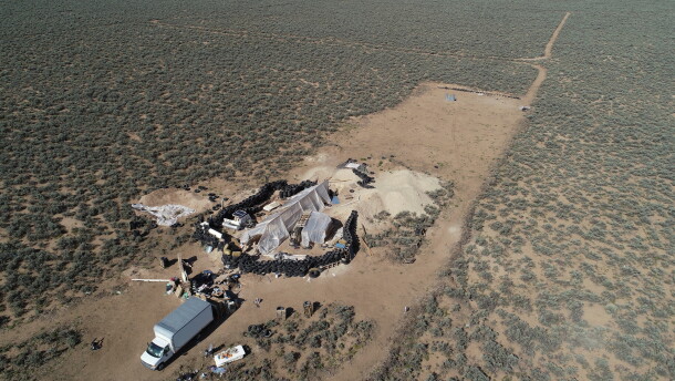 FILE - An aerial view of a makeshift compound is seen in the desert area of Amalia, N.M., Aug. 10, 2018.