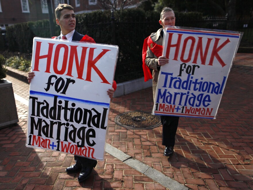 Zachariah Long (left) and Edward Ritchie protest against a gay-marriage bill in Annapolis, Md., on Feb. 17. The bill passed, but the issue is being put directly to Maryland voters on Nov. 6.