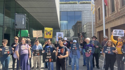 Community members protest outside of SFPD's headquarters. 