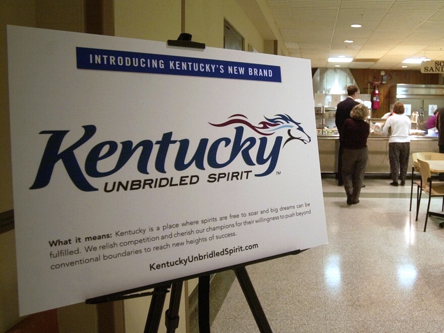 A display showing Kentucky's current logo and slogan, and explaining what it means, sits in the Capitol Annex cafeteria in 2005.
