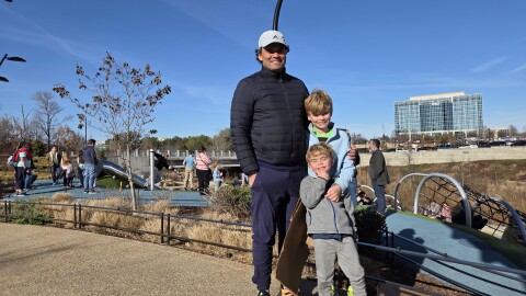 Ross Glynn and his children, Christian and Holden, at the playground at the Ballantyne Bowl.