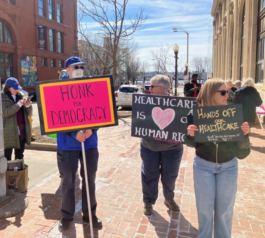 About 20 people gathered Monday at noon (March 23), to protest recent action by Congress to let ACA tax credits expire, raising the costs for already high healthcare premiums.