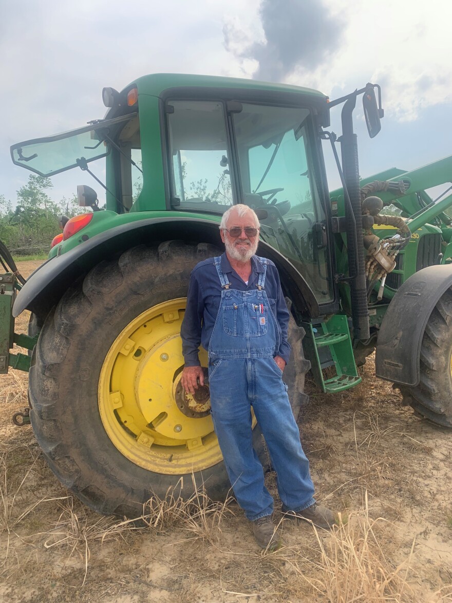 Lost Valley Farms owner Danny Miller of Bremen is clearing fields of tornado debris before getting planting season underway.