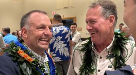 Hawaiʻi Gov. Josh Green, left, speaks with U.S. Rep. Ed Case at the Democratic Party's post-primary election unity breakfast on Sunday, Aug. 9, 2026.