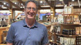 Bob Sutherland, owner of Cherry Republic inside his downtown Traverse City location (Photo : Ed Ronco / IPR News)