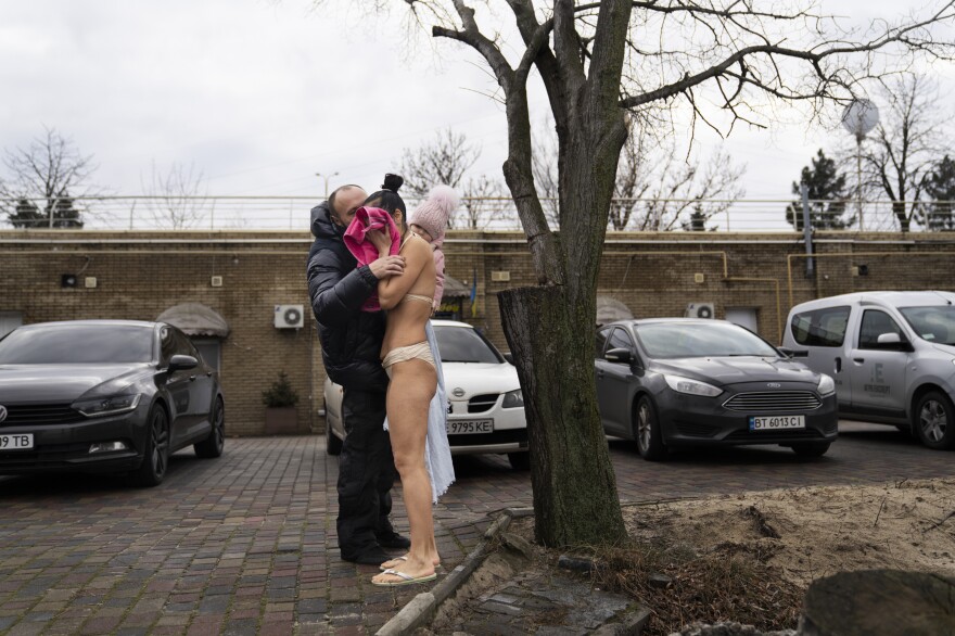 Otkydach's husband greets her with a towel in one hand and their nearly 2-year-old daughter in the other.