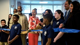 Norwalk Public Schools Superintendent Alexandra Estrella (center) cuts the ribbon to the health and wellness center at Kendall College and Career Academy in Norwalk, along with students, staff, Norwalk Mayor Barbara Smyth and U.S. Rep Jim Himes on March 10, 2026.