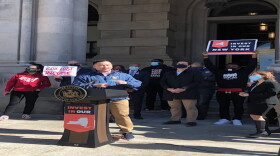 Assemlbyman Ron Kim, D-Queens, spoke at a rally to celebrate the inclusion of new taxes on the wealthy and increased school funding in the state budget, at a rally outside the State Capitol on April 7, 2021.